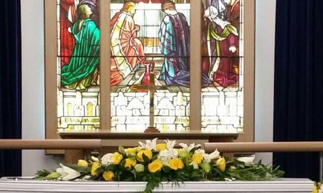 Elegant White and Yellow Casket Flowers