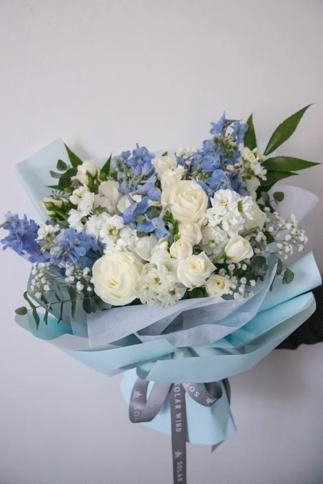 Blue angel bouquet arranged by Sun's Florist, Kogarah