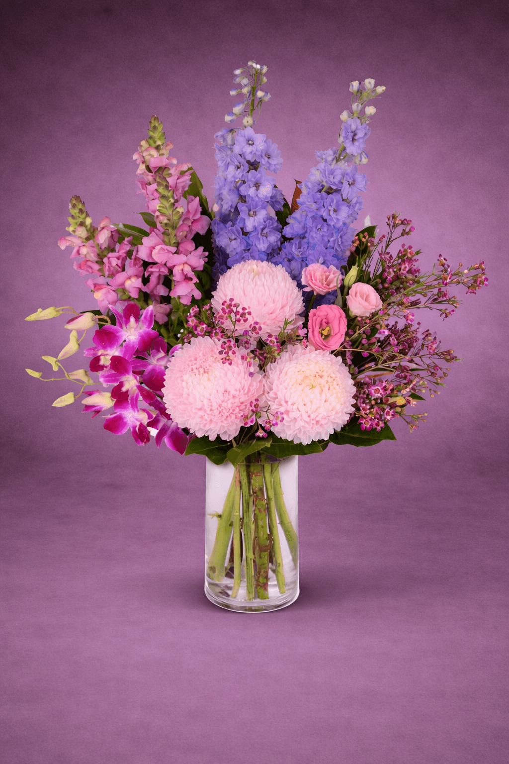 Vibrant Floral Arrangement in Clear Vase