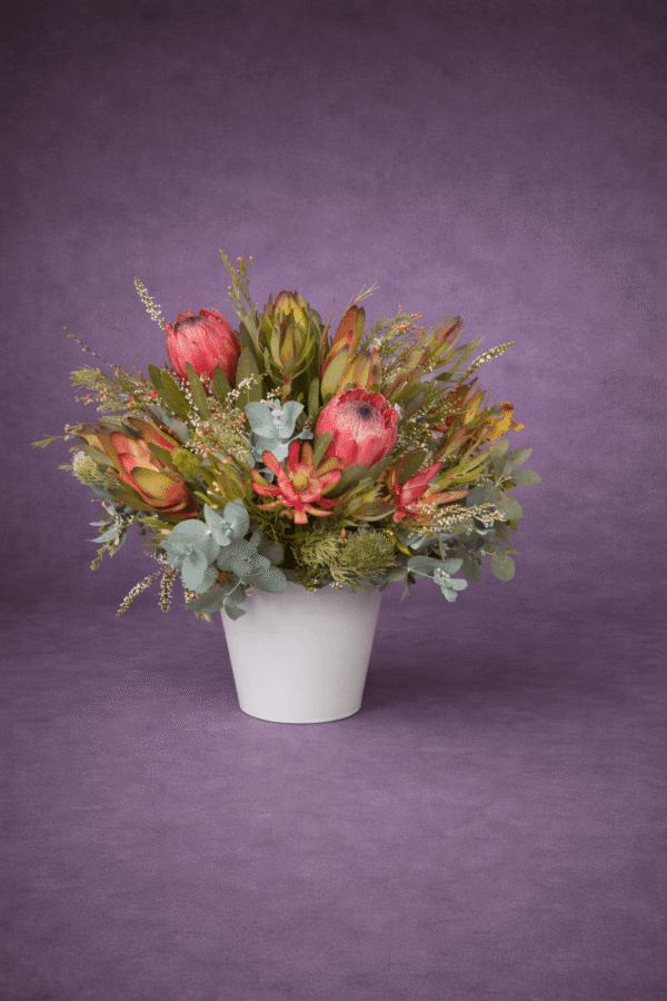 Vibrant Protea Bouquet arranged by Sun's Florist, Kogarah